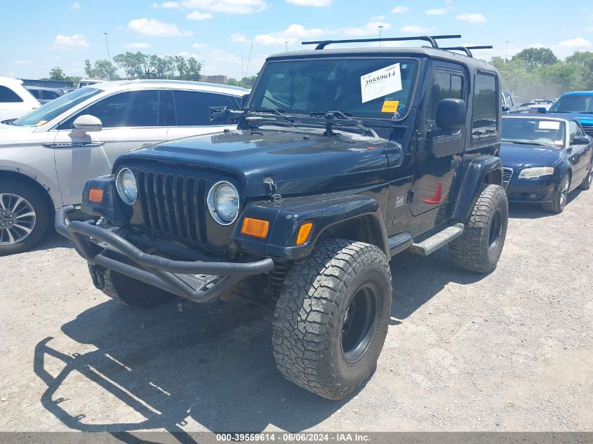 2004 Jeep Wrangler Sahara VIN: 1J4FA59SX4P703184 Lot: 39559614