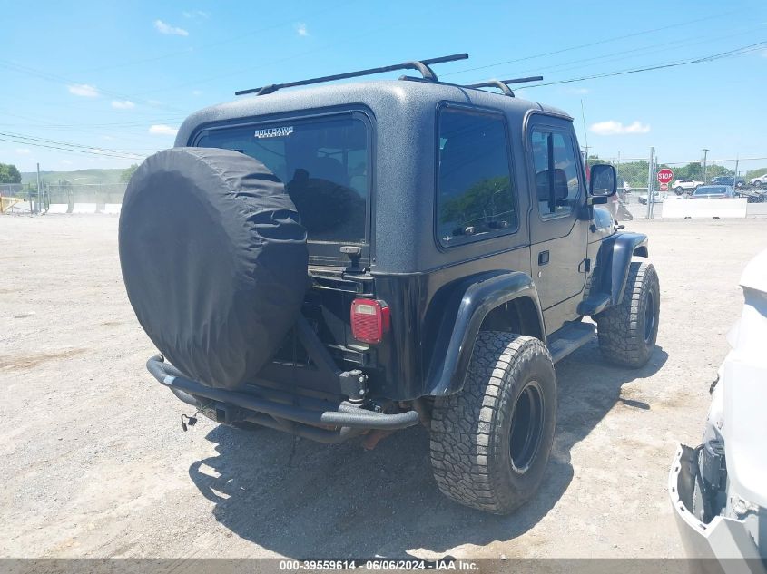 2004 Jeep Wrangler Sahara VIN: 1J4FA59SX4P703184 Lot: 39559614