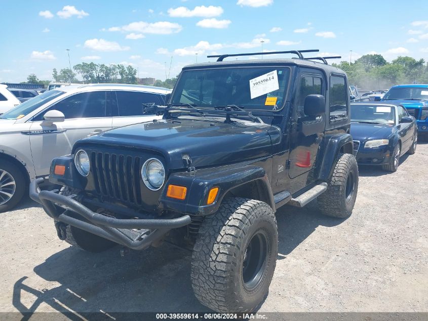 2004 Jeep Wrangler Sahara VIN: 1J4FA59SX4P703184 Lot: 39559614