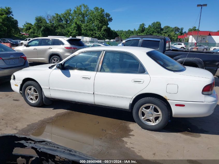 1996 Mazda 626 Dx/Lx VIN: 1YVGE22C0T5521353 Lot: 39560486