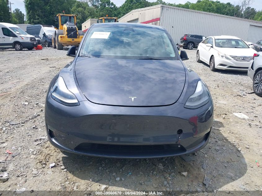 2023 Tesla Model Y Awd/Long Range Dual Motor All-Wheel Drive VIN: 7SAYGAEE8PF848389 Lot: 39560670