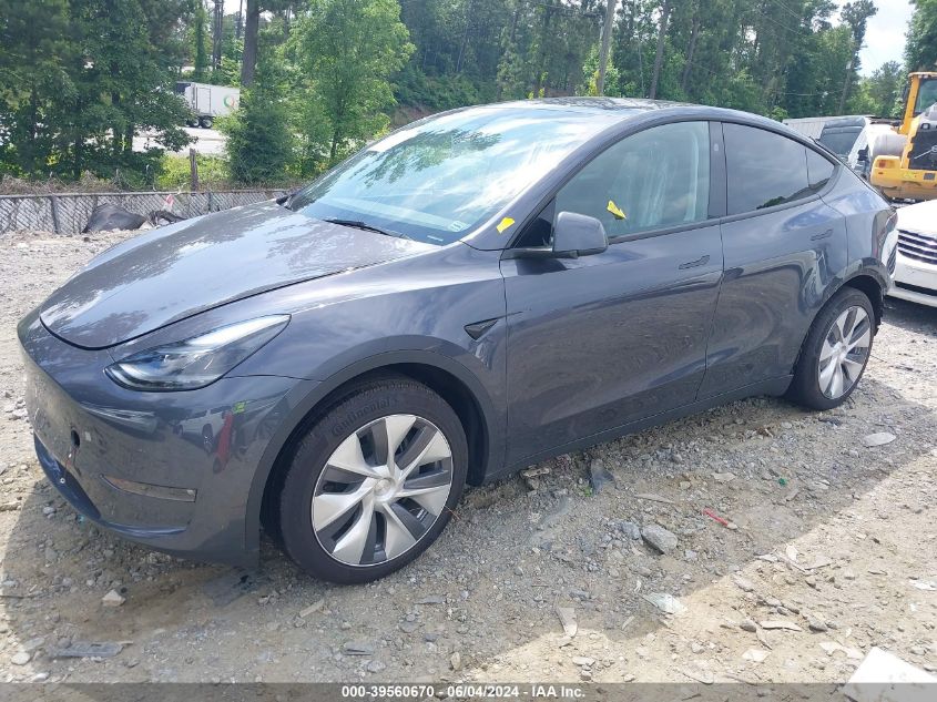 2023 Tesla Model Y Awd/Long Range Dual Motor All-Wheel Drive VIN: 7SAYGAEE8PF848389 Lot: 39560670