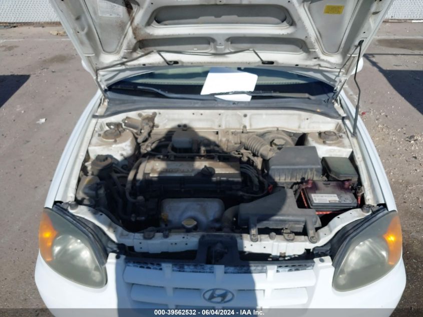 2004 Hyundai Accent Gl VIN: KMHCG45C14U539272 Lot: 39562532