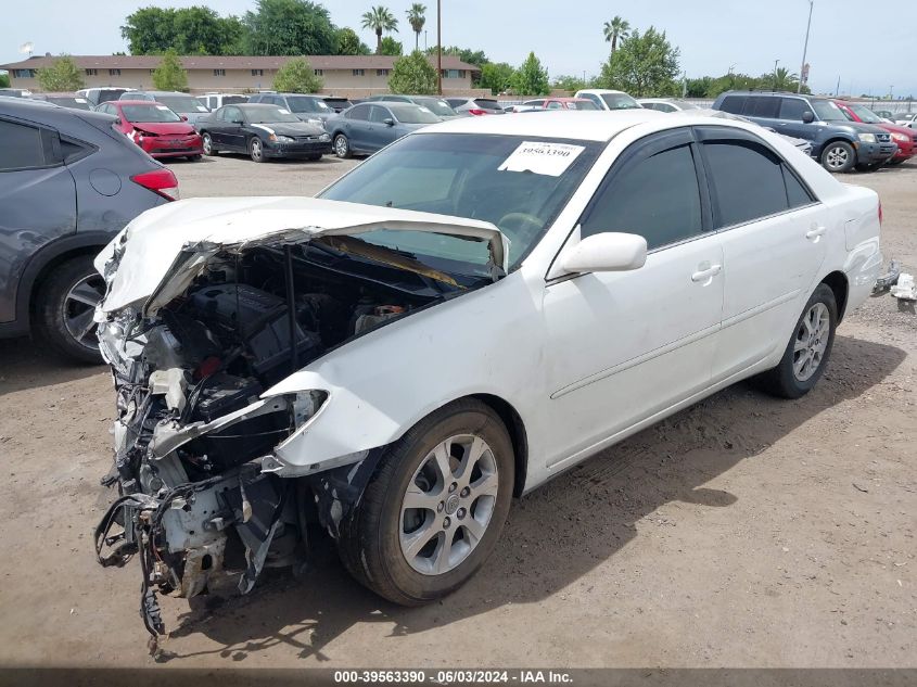 2004 Toyota Camry Le VIN: JTDBE30K540285894 Lot: 39563390