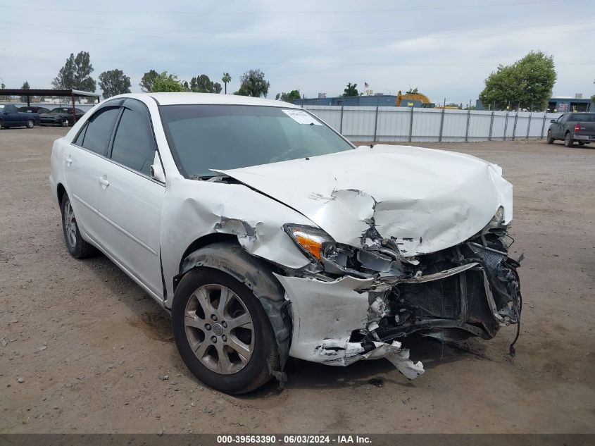 2004 Toyota Camry Le VIN: JTDBE30K540285894 Lot: 39563390