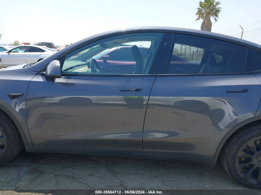 2023 Tesla Model Y Awd/Long Range Dual Motor All-Wheel Drive VIN: 7SAYGDEE2PF910029 Lot: 39564712