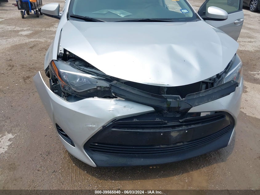 2017 Toyota Corolla Le VIN: 5YFBURHE7HP719135 Lot: 39565040