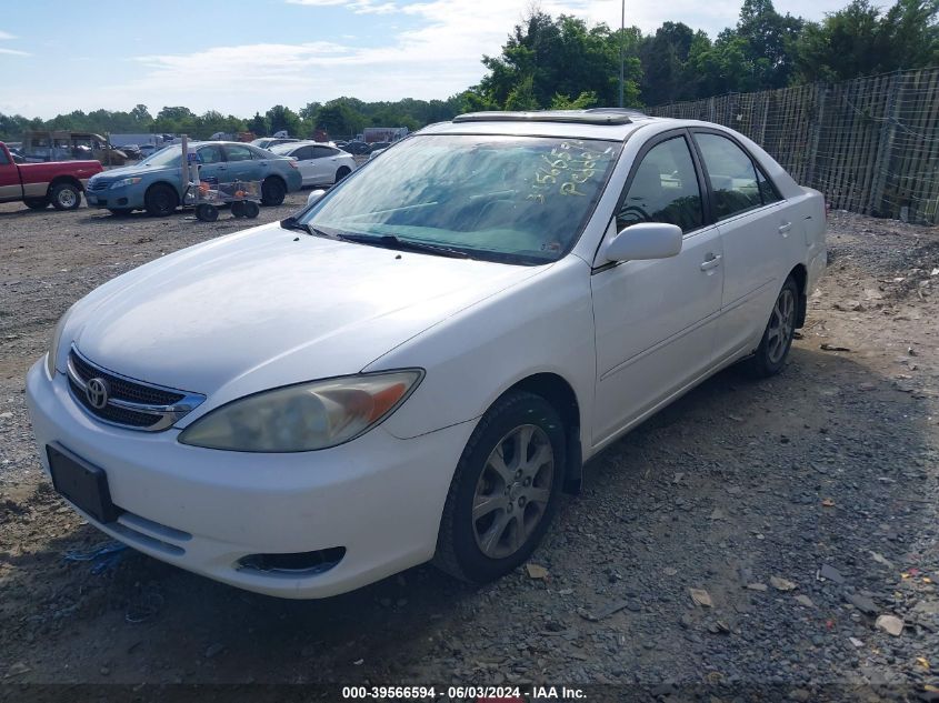 2004 Toyota Camry Le VIN: JTDBE32K040254677 Lot: 39566594