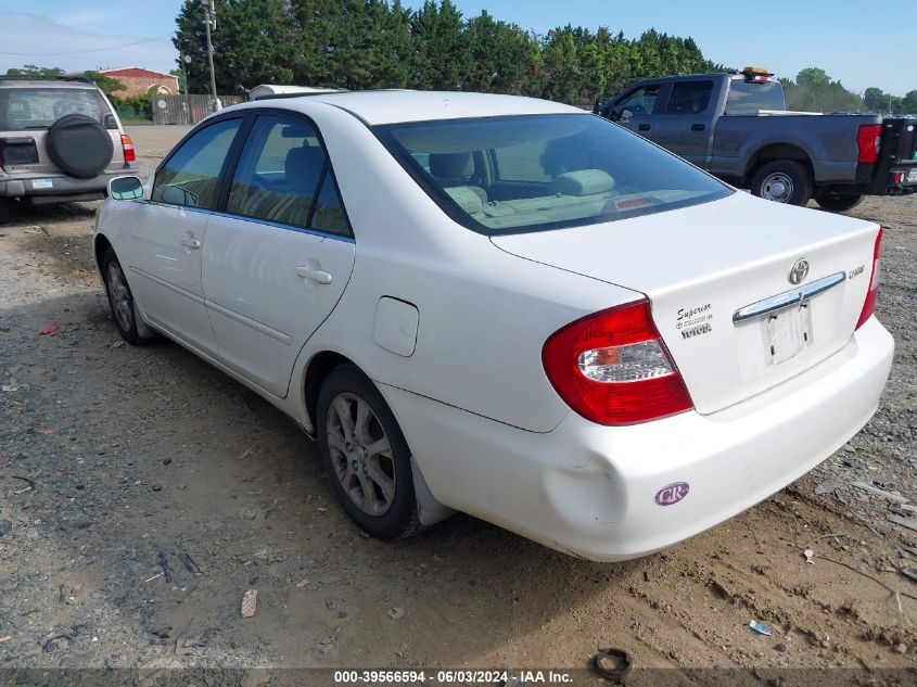 2004 Toyota Camry Le VIN: JTDBE32K040254677 Lot: 39566594