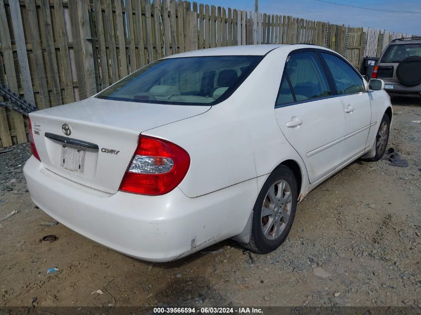 2004 Toyota Camry Le VIN: JTDBE32K040254677 Lot: 39566594