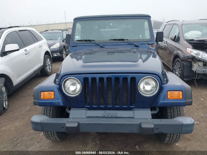 2000 Jeep Wrangler Sport VIN: 1J4FA49S6YP779100 Lot: 39568940