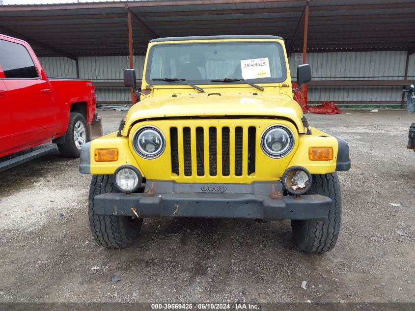 2000 Jeep Wrangler Sport VIN: 1J4FA49S4YP757175 Lot: 39569425