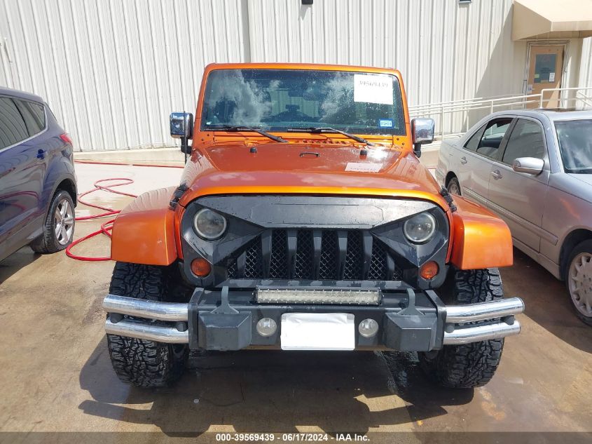 2011 Jeep Wrangler Unlimited Sahara VIN: 1J4BA5H10BL558202 Lot: 39569439