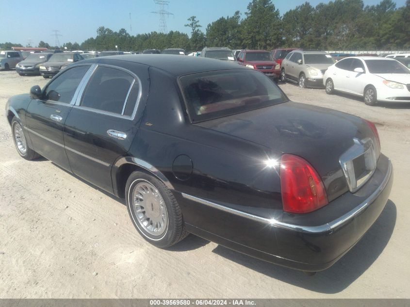 2001 Lincoln Town Car Cartier VIN: 1LNHM83WX1Y703626 Lot: 39569580