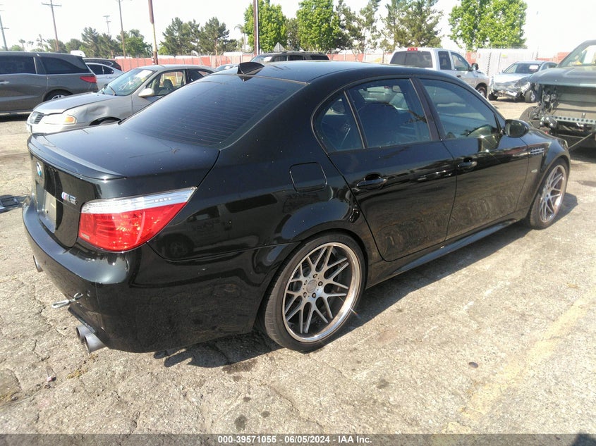 2007 BMW M5 VIN: WBSNB93587CX07053 Lot: 39571055