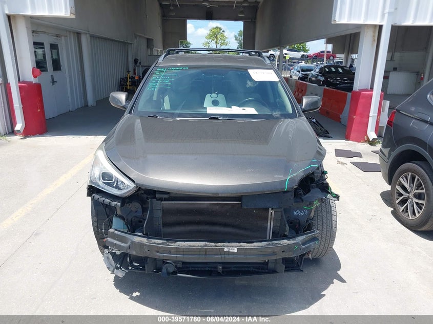 2014 Hyundai Santa Fe Sport 2.4L VIN: 5XYZU3LB0EG207404 Lot: 39571780