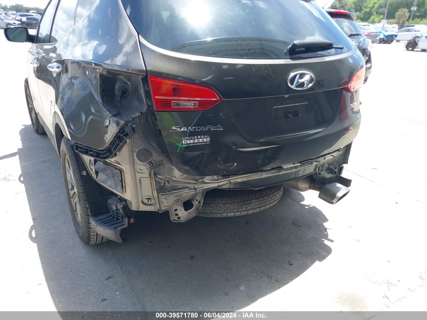 2014 Hyundai Santa Fe Sport 2.4L VIN: 5XYZU3LB0EG207404 Lot: 39571780