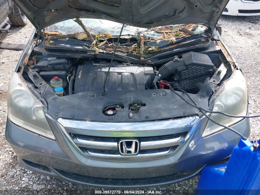 2007 Honda Odyssey Lx VIN: 5FNRL38297B012052 Lot: 39572770