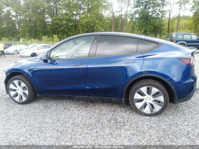 2023 Tesla Model Y Awd/Long Range Dual Motor All-Wheel Drive VIN: 7SAYGDEE4PA175986 Lot: 39573070