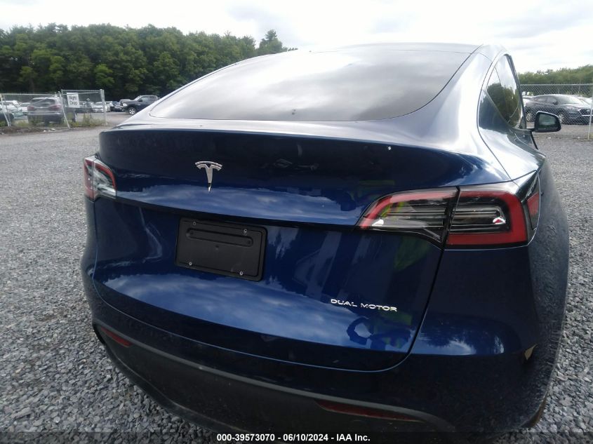 2023 Tesla Model Y Awd/Long Range Dual Motor All-Wheel Drive VIN: 7SAYGDEE4PA175986 Lot: 39573070
