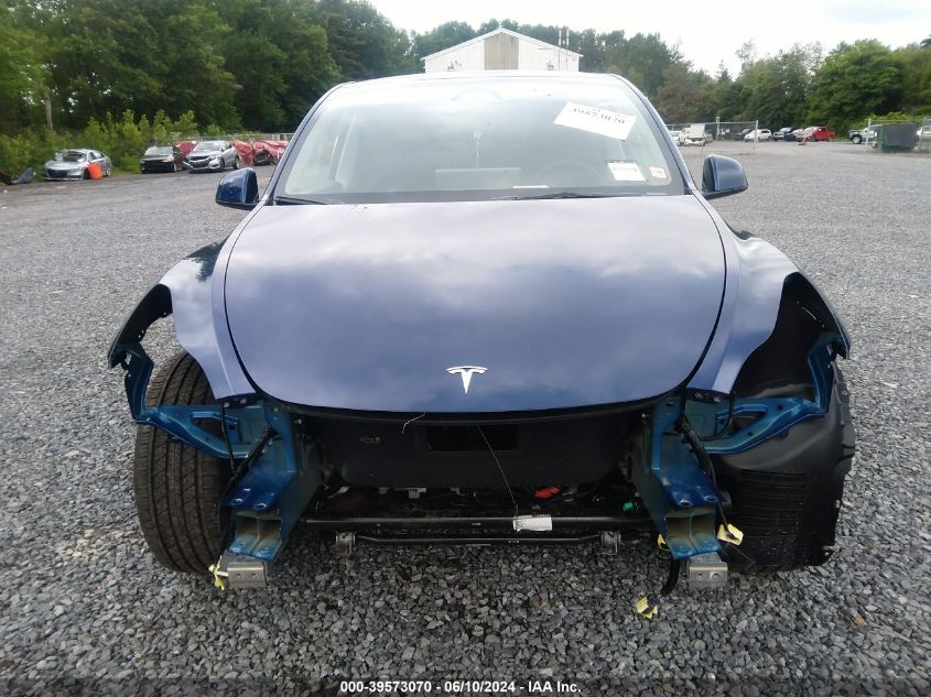 2023 Tesla Model Y Awd/Long Range Dual Motor All-Wheel Drive VIN: 7SAYGDEE4PA175986 Lot: 39573070