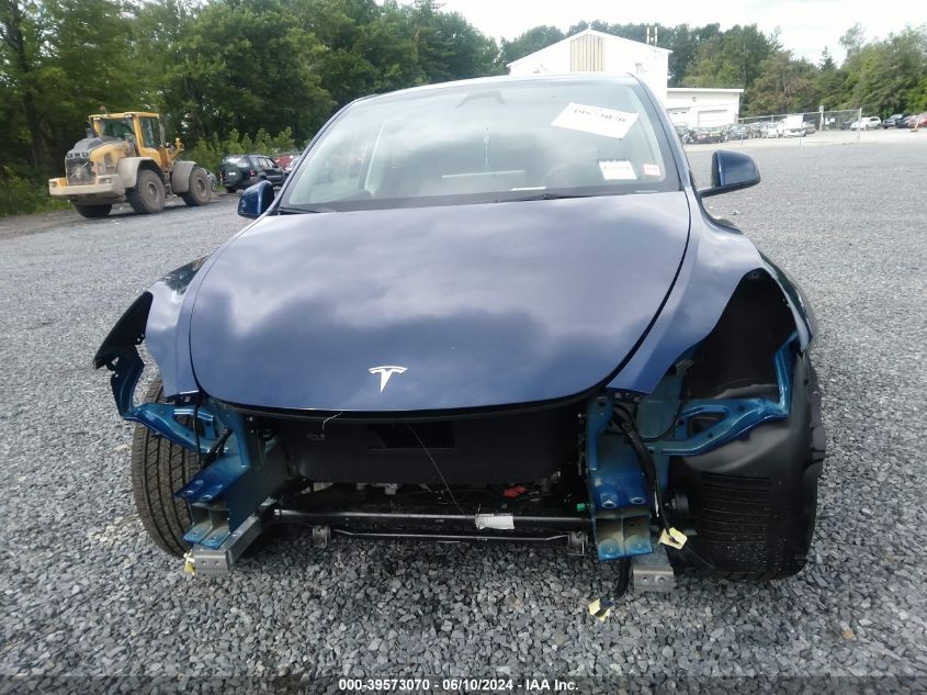 2023 Tesla Model Y Awd/Long Range Dual Motor All-Wheel Drive VIN: 7SAYGDEE4PA175986 Lot: 39573070