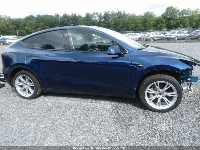 2023 Tesla Model Y Awd/Long Range Dual Motor All-Wheel Drive VIN: 7SAYGDEE4PA175986 Lot: 39573070