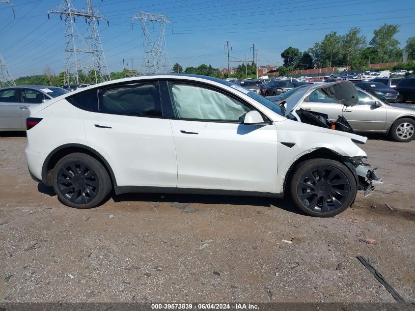 2023 Tesla Model Y Awd/Long Range Dual Motor All-Wheel Drive VIN: 7SAYGDEE9PF688931 Lot: 39573839