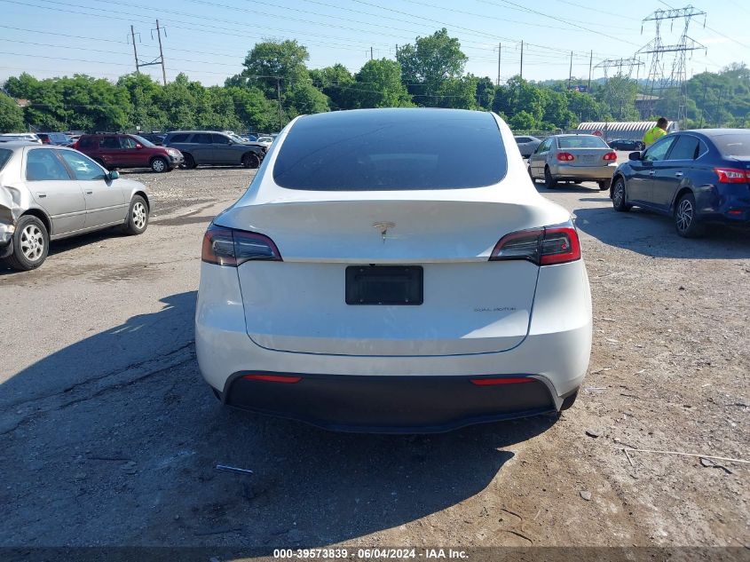 2023 Tesla Model Y Awd/Long Range Dual Motor All-Wheel Drive VIN: 7SAYGDEE9PF688931 Lot: 39573839