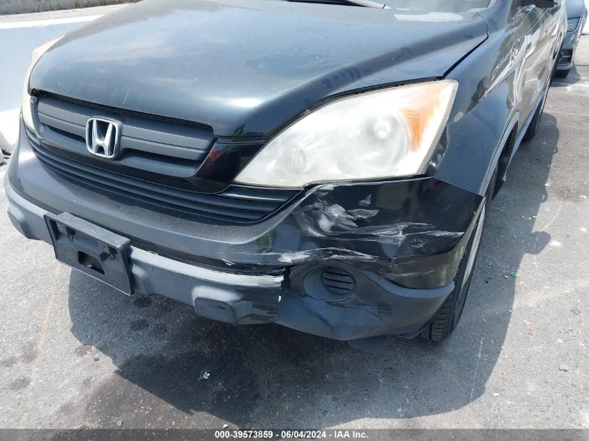 2009 Honda Cr-V Lx VIN: JHLRE38339C013705 Lot: 39573859