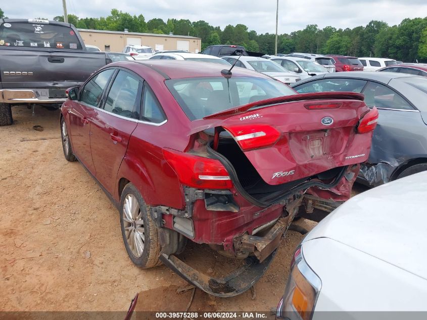 2016 Ford Focus Titanium VIN: 1FADP3J2XGL235938 Lot: 39575288