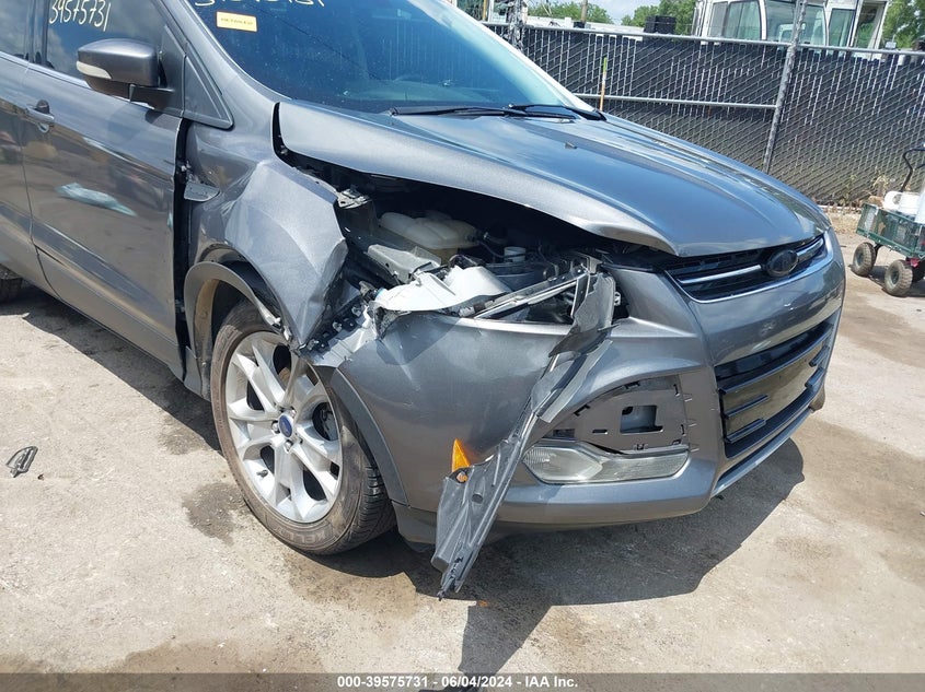 2014 Ford Escape Titanium VIN: 1FMCU0JX9EUD10916 Lot: 39575731