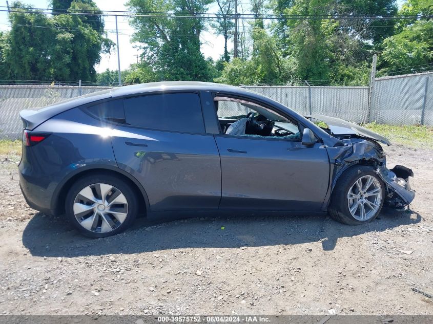 2023 Tesla Model Y Awd/Long Range Dual Motor All-Wheel Drive VIN: 7SAYGDEE4PF793554 Lot: 39575752