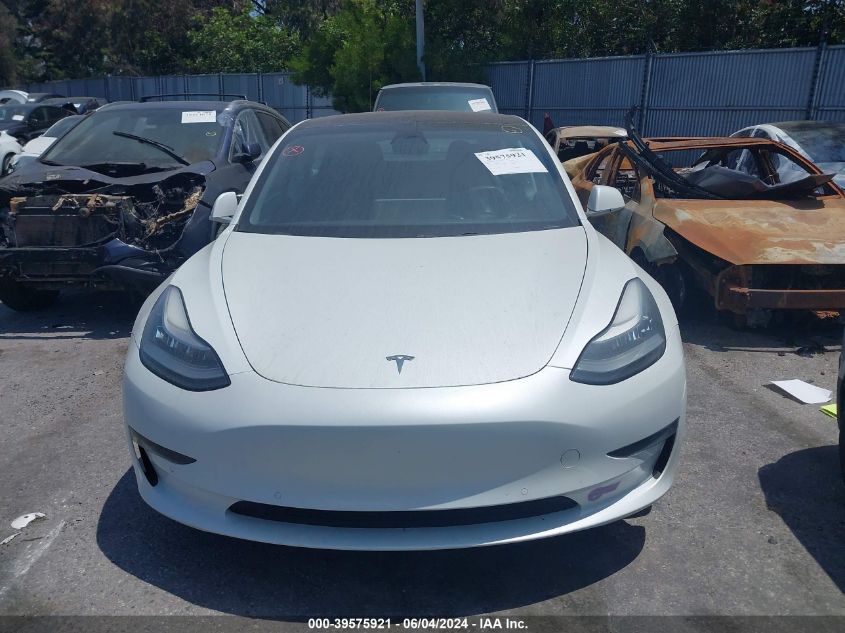 2018 Tesla Model 3 Long Range/Mid Range VIN: 5YJ3E1EA7JF164810 Lot: 39575921