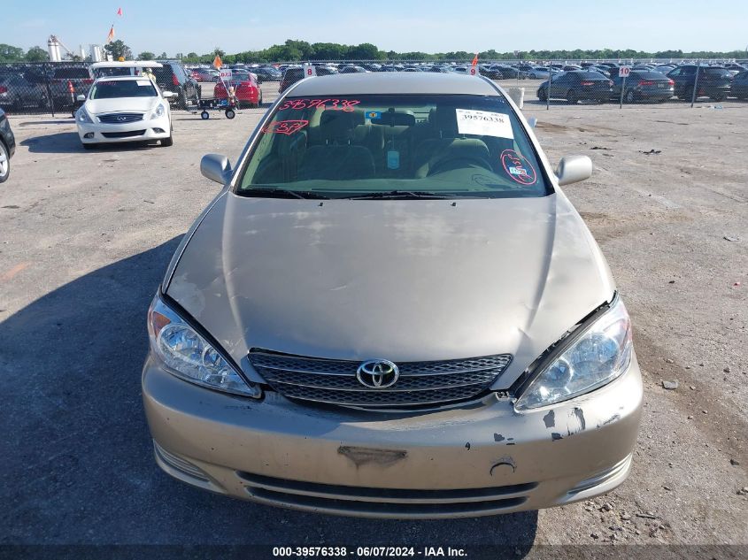 2003 Toyota Camry Le VIN: 4T1BE32K33U198138 Lot: 39576338