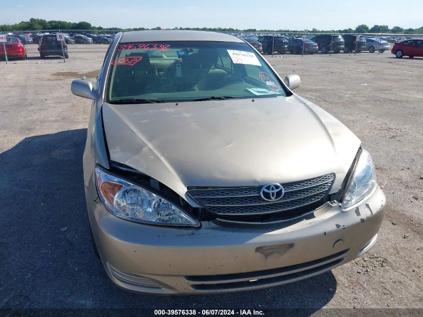 2003 Toyota Camry Le VIN: 4T1BE32K33U198138 Lot: 39576338