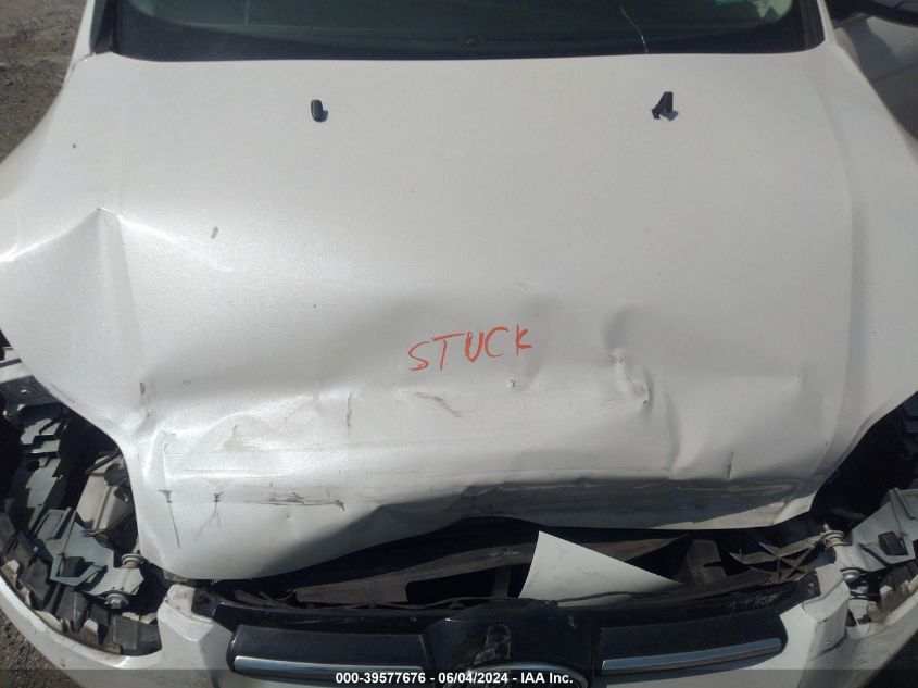 2014 Ford Focus Titanium VIN: 1FADP3N23EL310065 Lot: 39577676