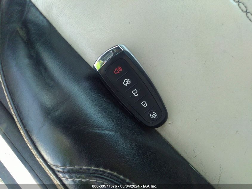 2014 Ford Focus Titanium VIN: 1FADP3N23EL310065 Lot: 39577676