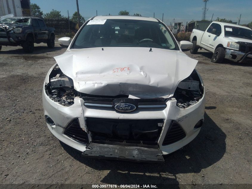 2014 Ford Focus Titanium VIN: 1FADP3N23EL310065 Lot: 39577676