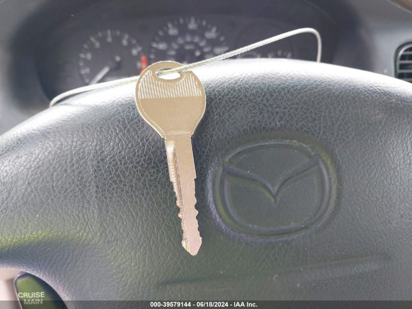 1999 Mazda 626 Es/Lx VIN: 1YVGF22C2X5896048 Lot: 39579144