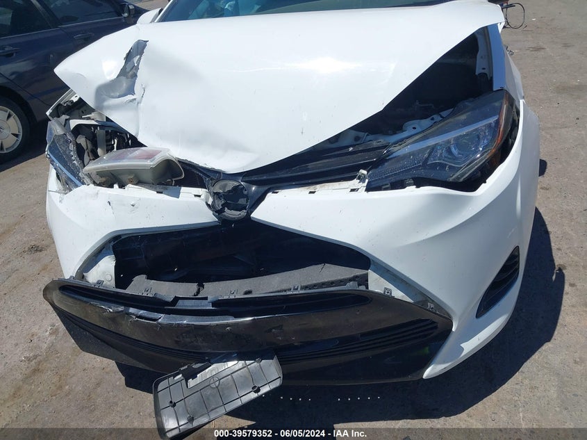 2017 Toyota Corolla Le VIN: 5YFBURHEXHP676829 Lot: 39579352