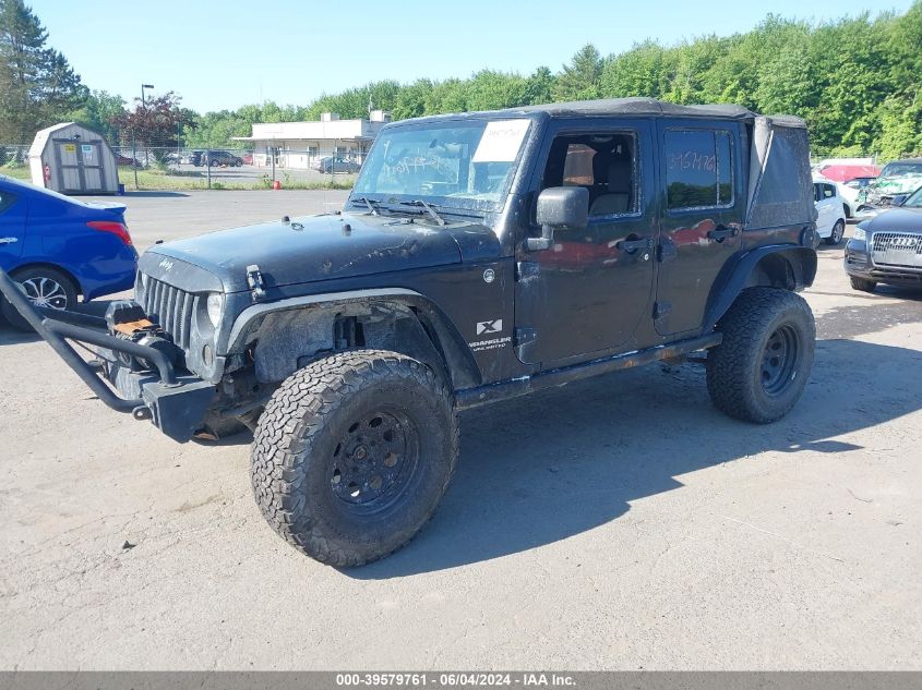 2008 Jeep Wrangler Unlimited X VIN: 1J4GA39198L573511 Lot: 39579761