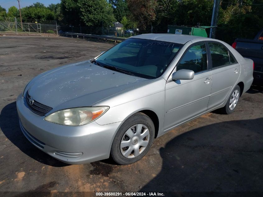 2003 Toyota Camry Le VIN: 4T1BE32KX3U720070 Lot: 39580291