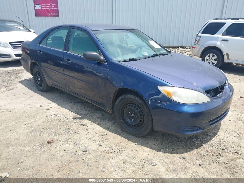 2002 Toyota Camry Le VIN: 4T1BE32K52U509986 Lot: 39581549