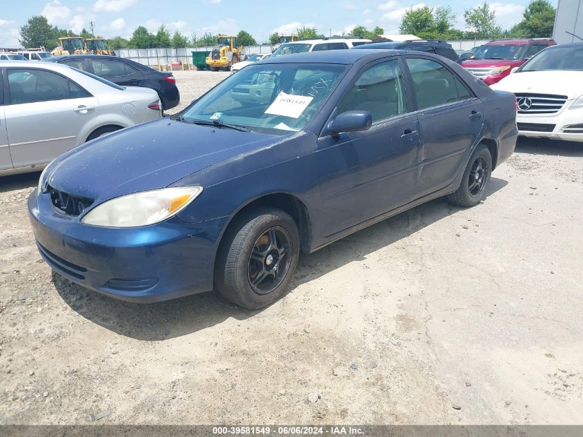 2002 Toyota Camry Le VIN: 4T1BE32K52U509986 Lot: 39581549