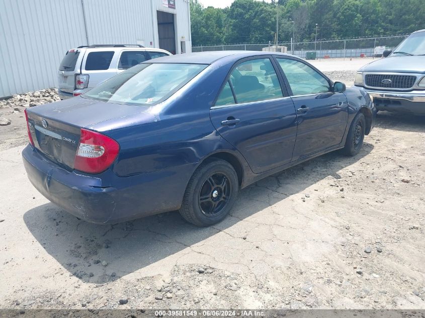 2002 Toyota Camry Le VIN: 4T1BE32K52U509986 Lot: 39581549