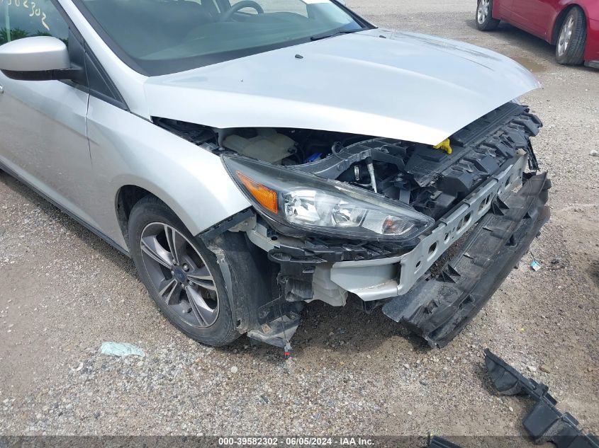 2018 Ford Focus Se VIN: 1FADP3FE2JL200823 Lot: 39582302