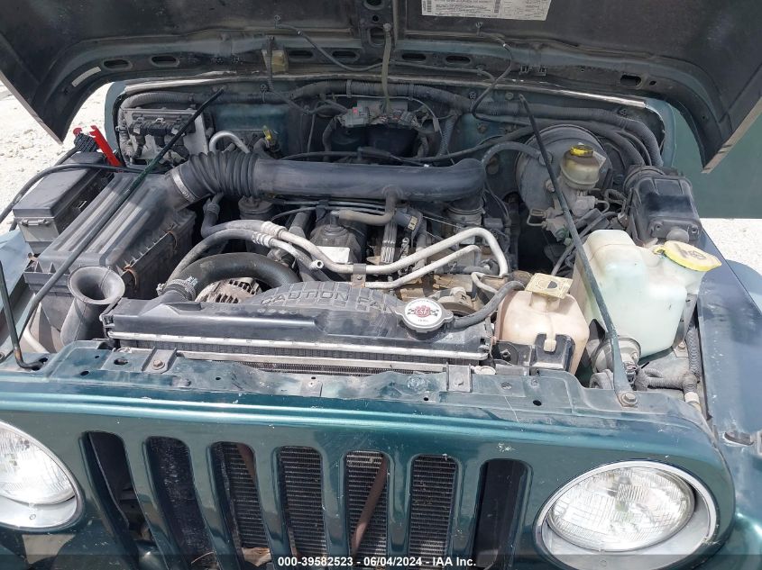 2000 Jeep Wrangler Sport VIN: 1J4FA49S7YP718676 Lot: 39582523