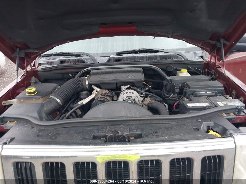 2007 Jeep Commander Sport VIN: 1J8HG48K17C647651 Lot: 39584264