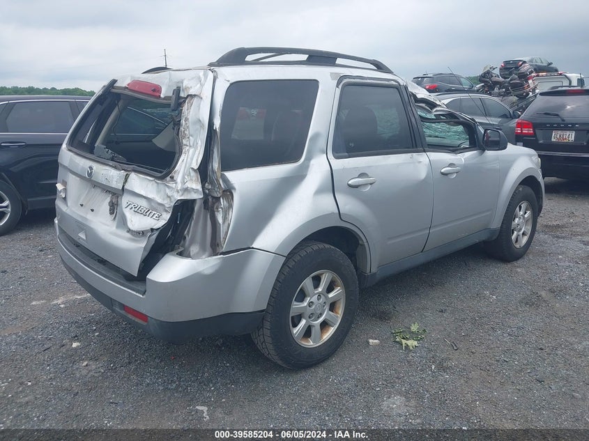 2010 Mazda Tribute I Touring VIN: 4F2CY9C7XAKM04948 Lot: 39585204